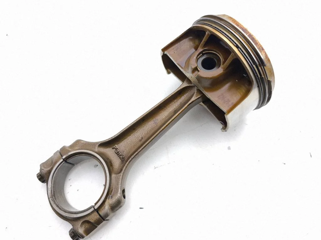 Piston with connecting rod 724212
