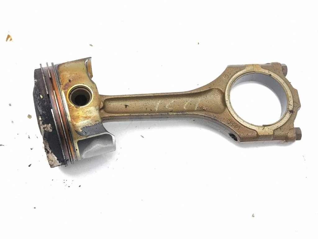 Piston with connecting rod
