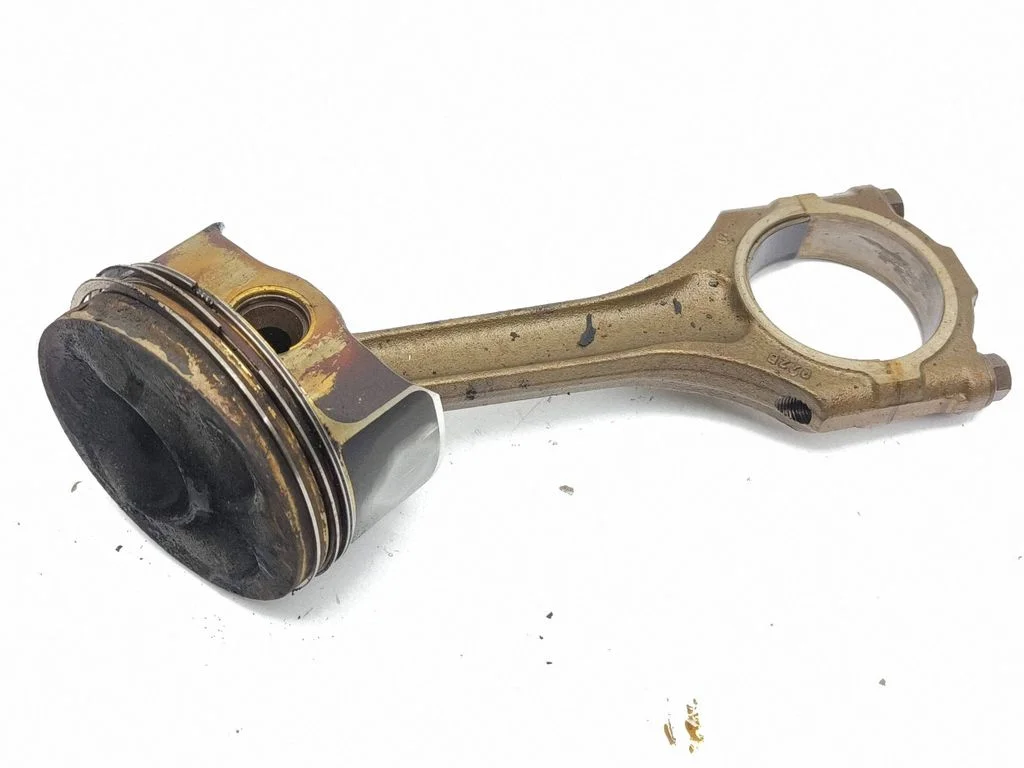 Piston with connecting rod