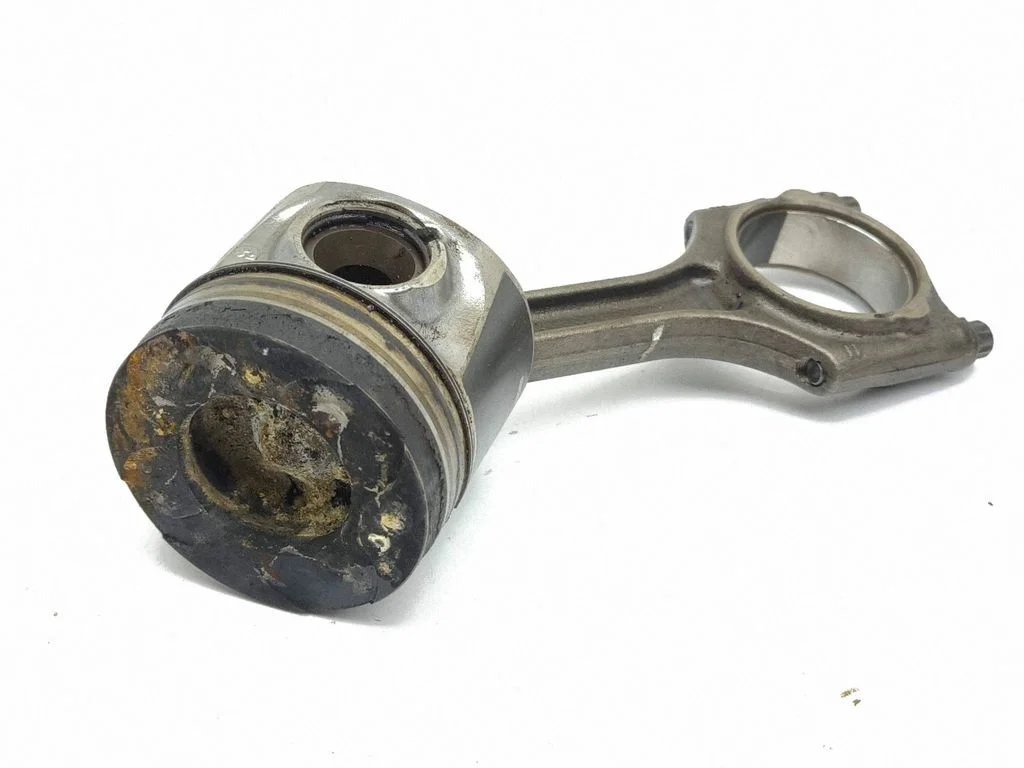 Piston with connecting rod