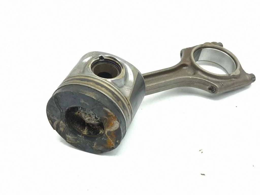 Piston with connecting rod