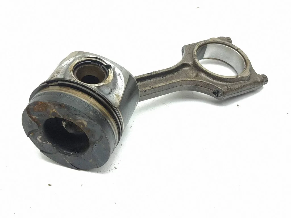 Piston with connecting rod