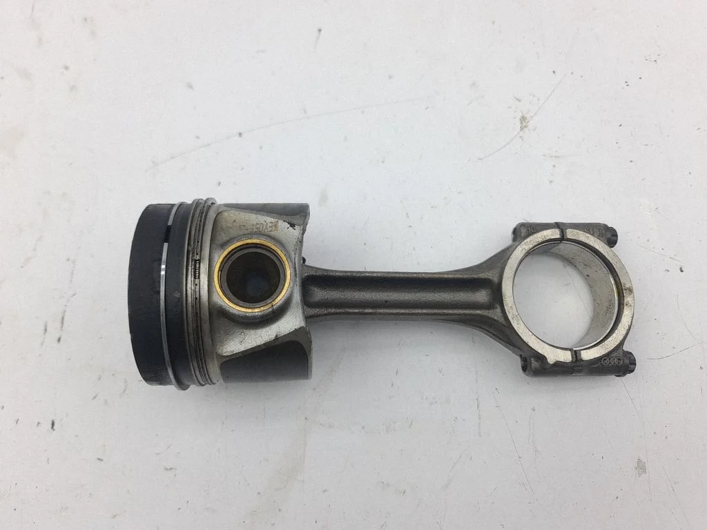Piston with connecting rod