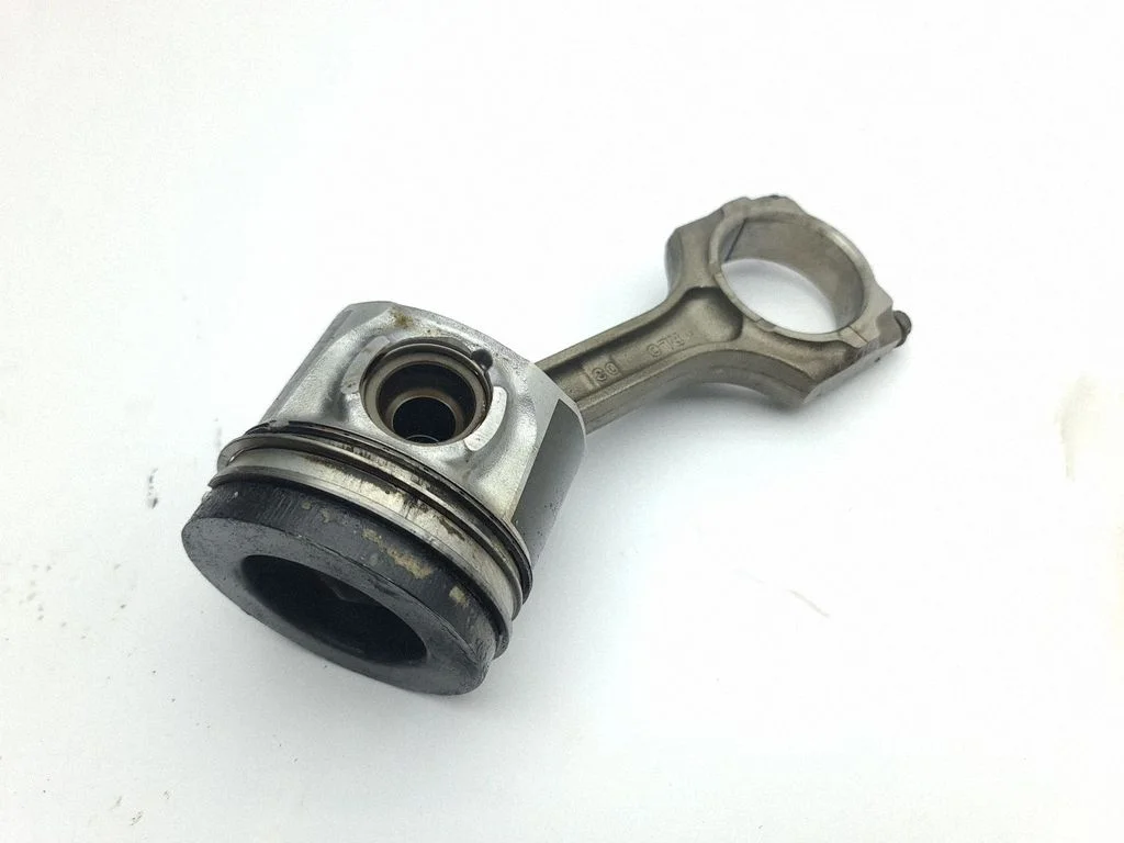 Piston with connecting rod