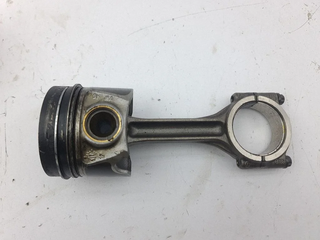 Piston with connecting rod