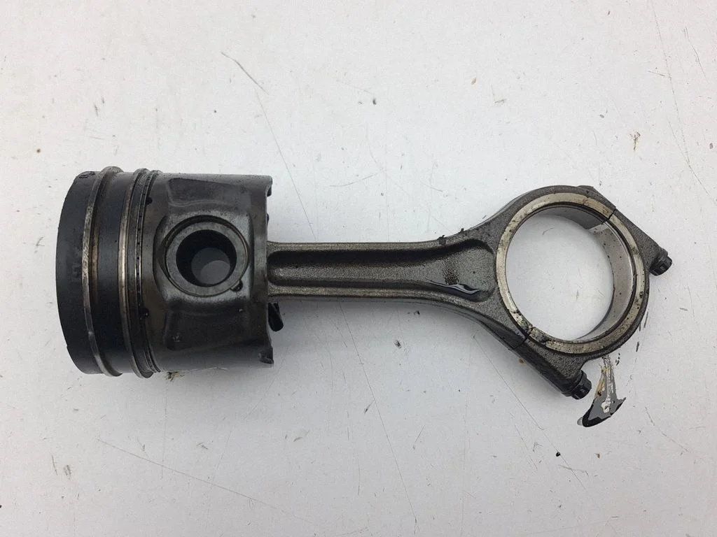 Piston with connecting rod