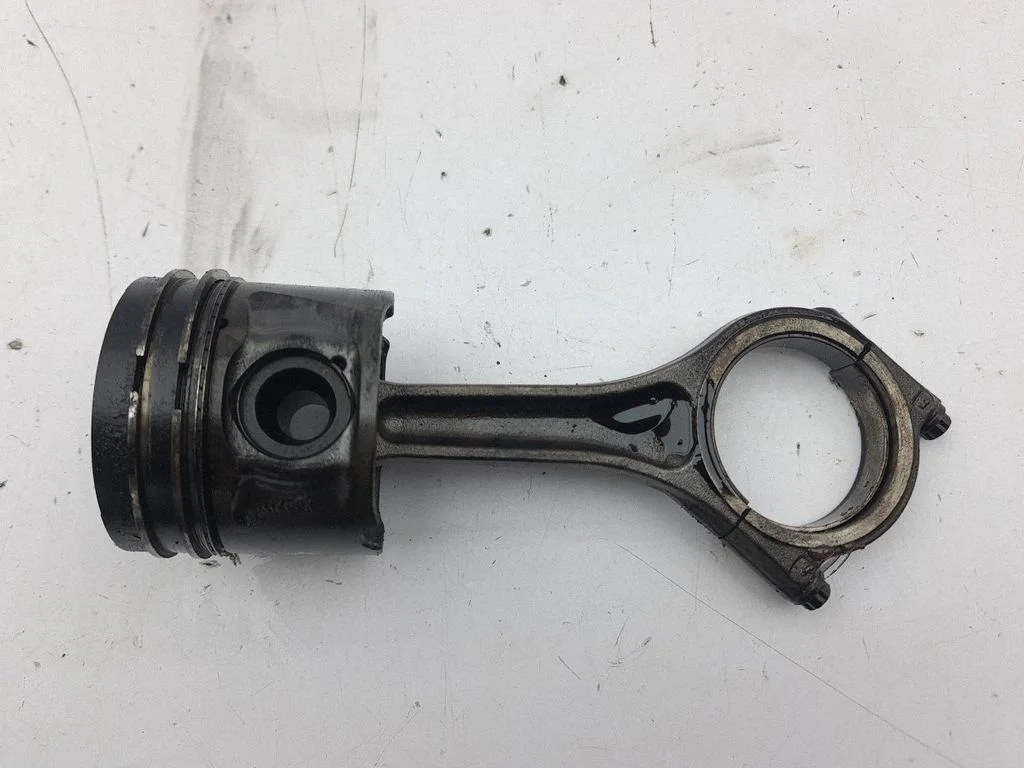 Piston with connecting rod