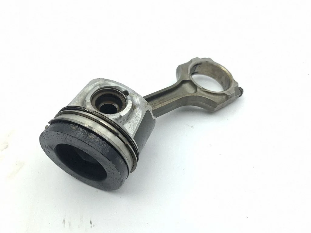 Piston with connecting rod