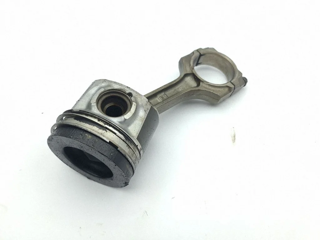 Piston with connecting rod