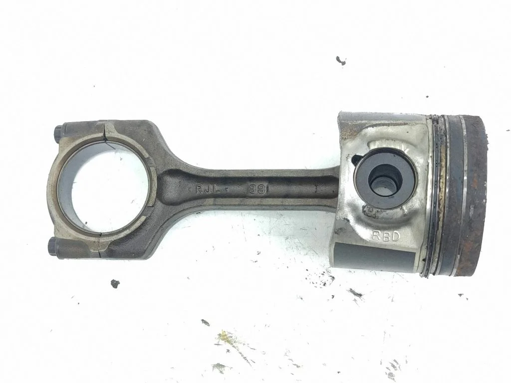 Piston with connecting rod