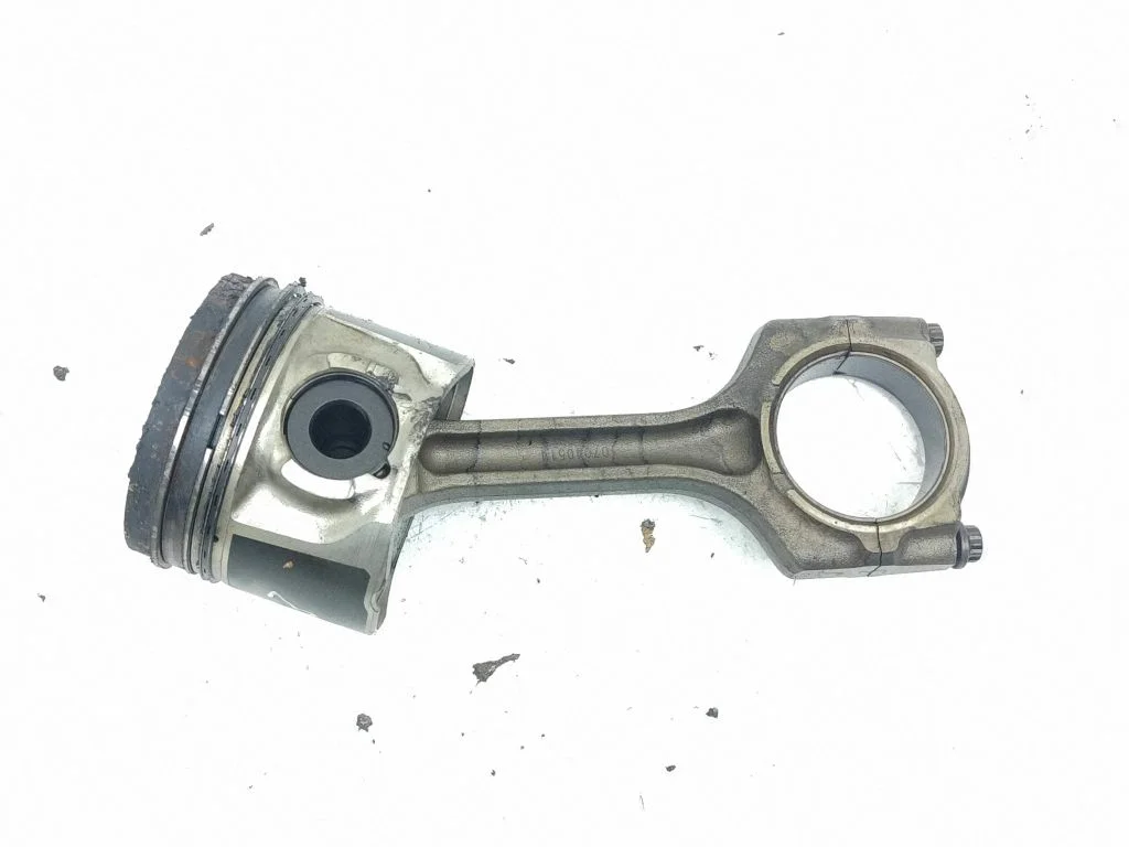 Piston with connecting rod