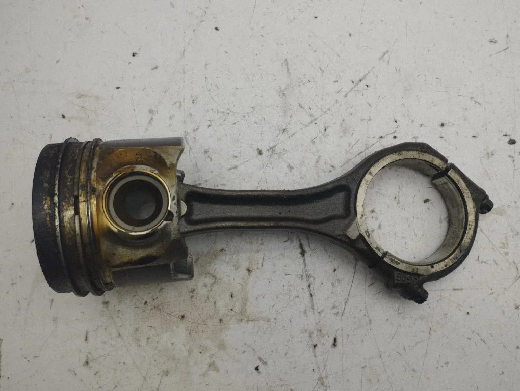 Piston with connecting rod