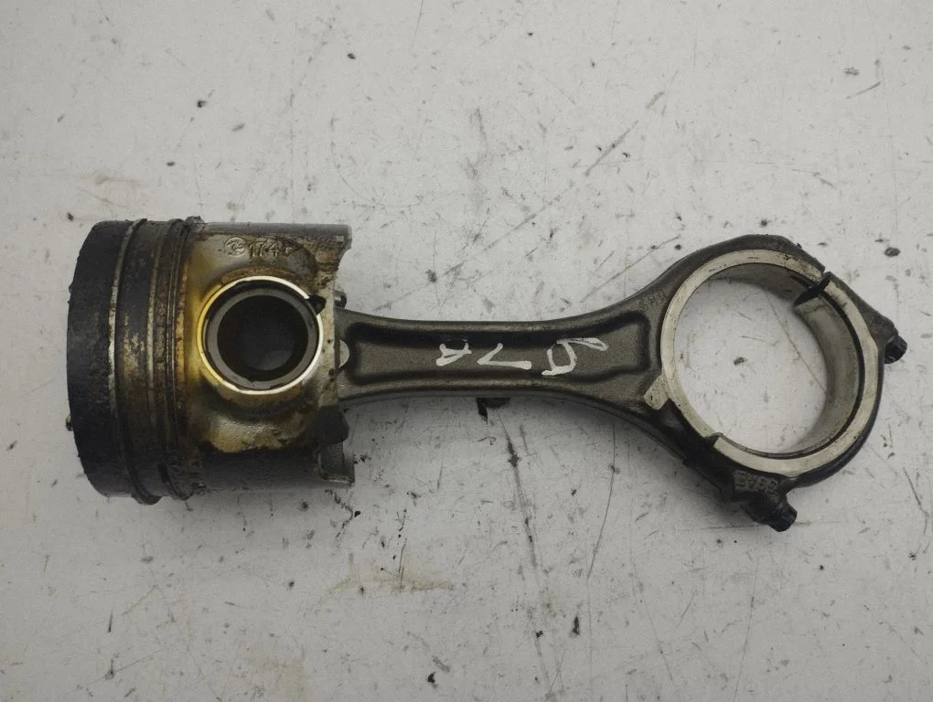 Piston with connecting rod