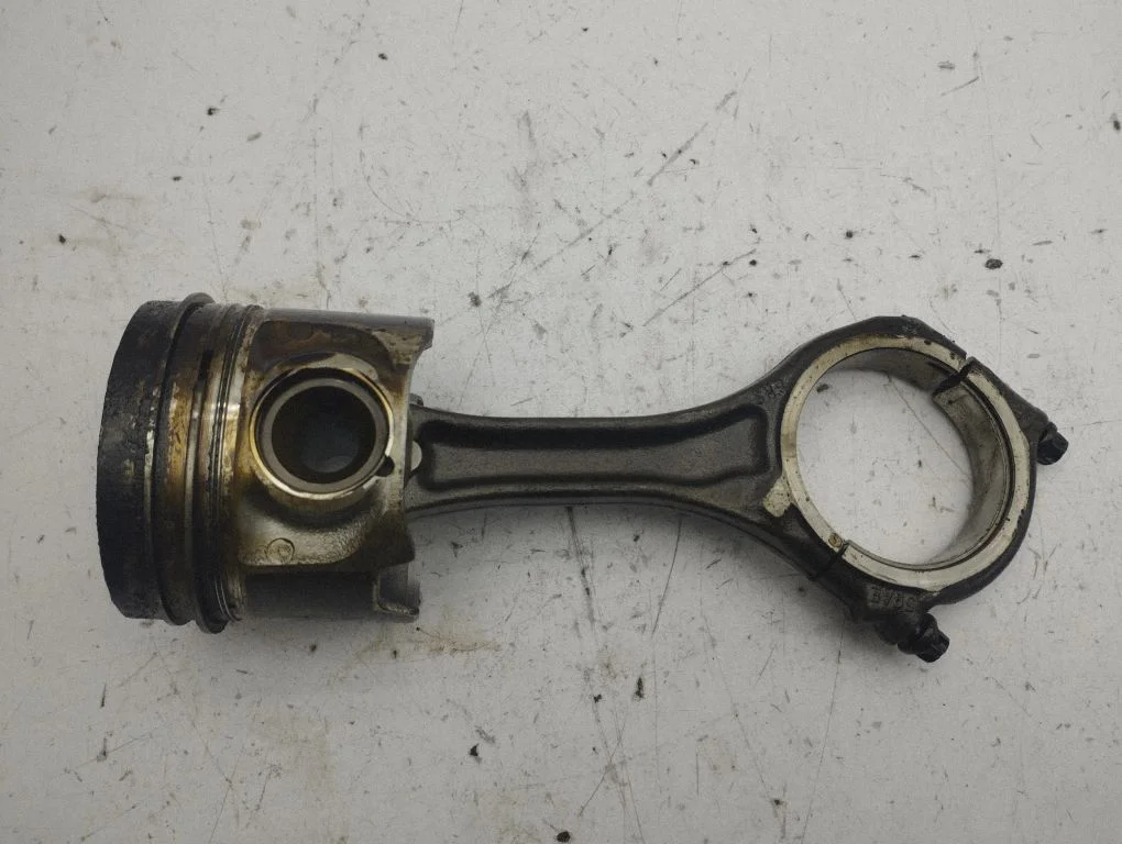 Piston with connecting rod