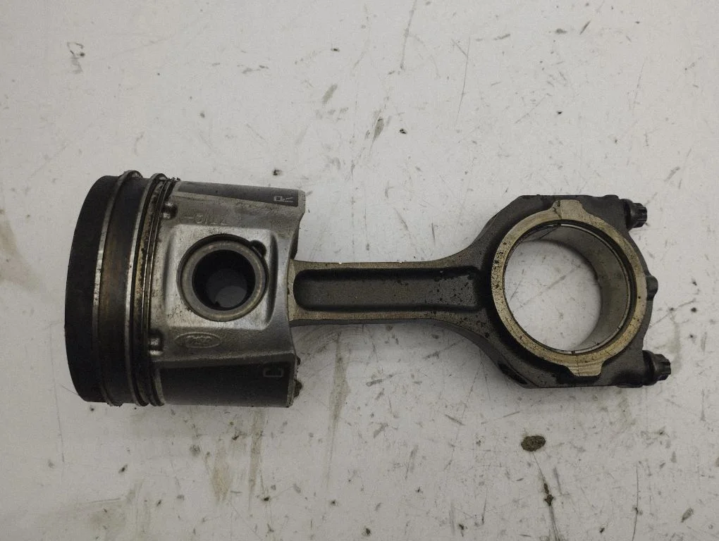 Piston with connecting rod