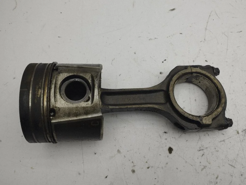 Piston with connecting rod