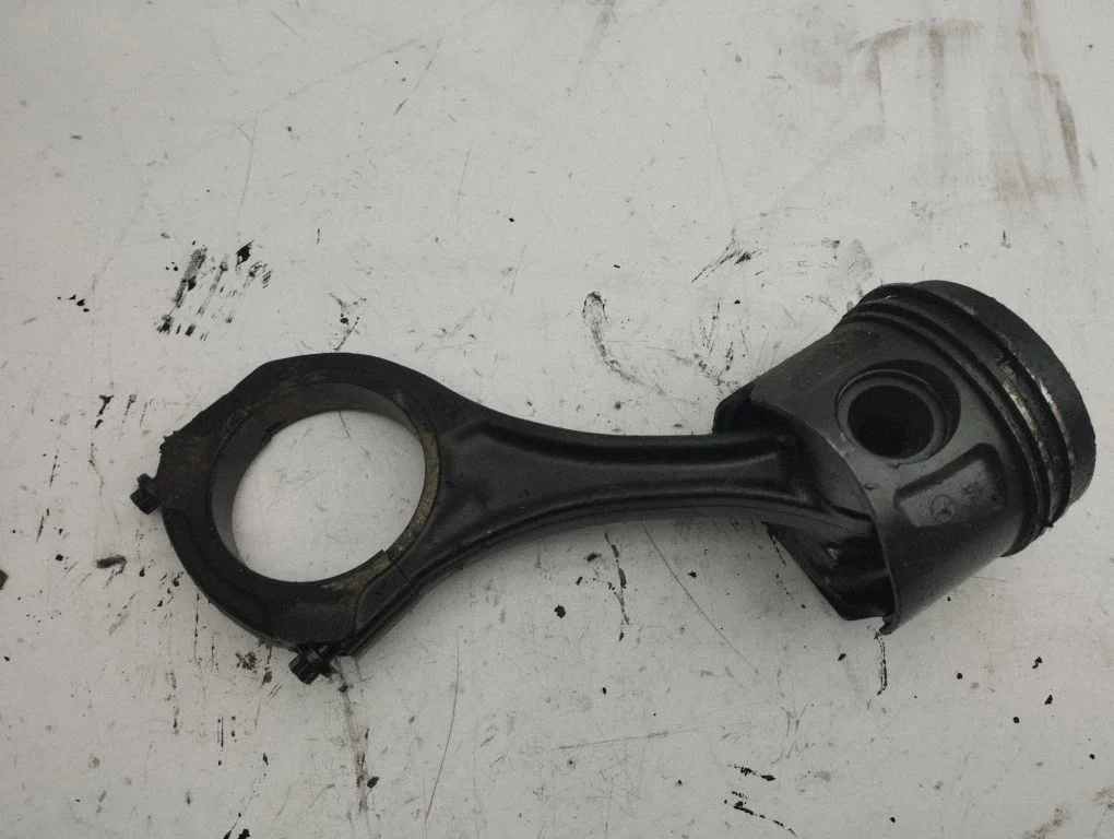 Piston with connecting rod