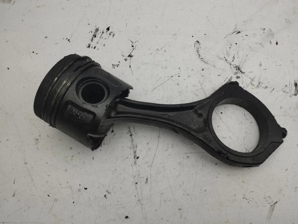 Piston with connecting rod
