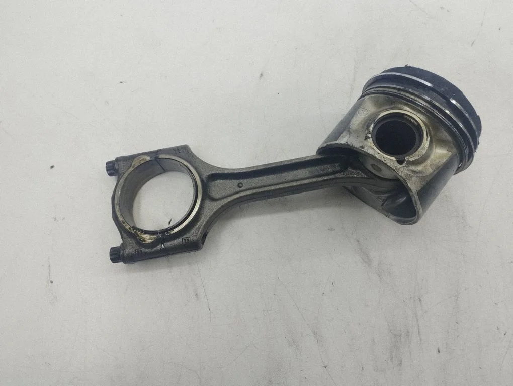 Piston with connecting rod