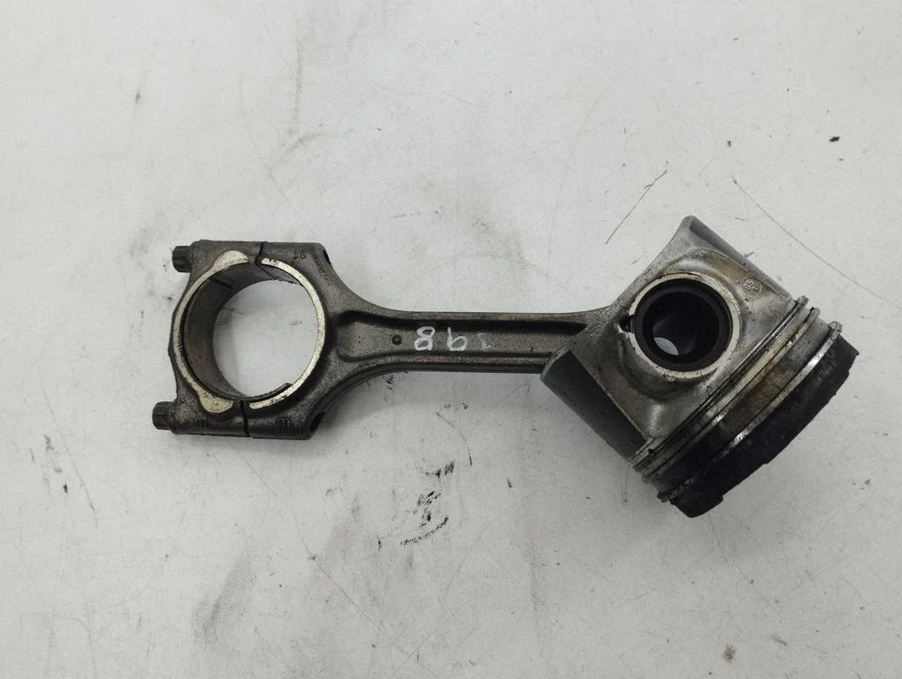 Piston with connecting rod