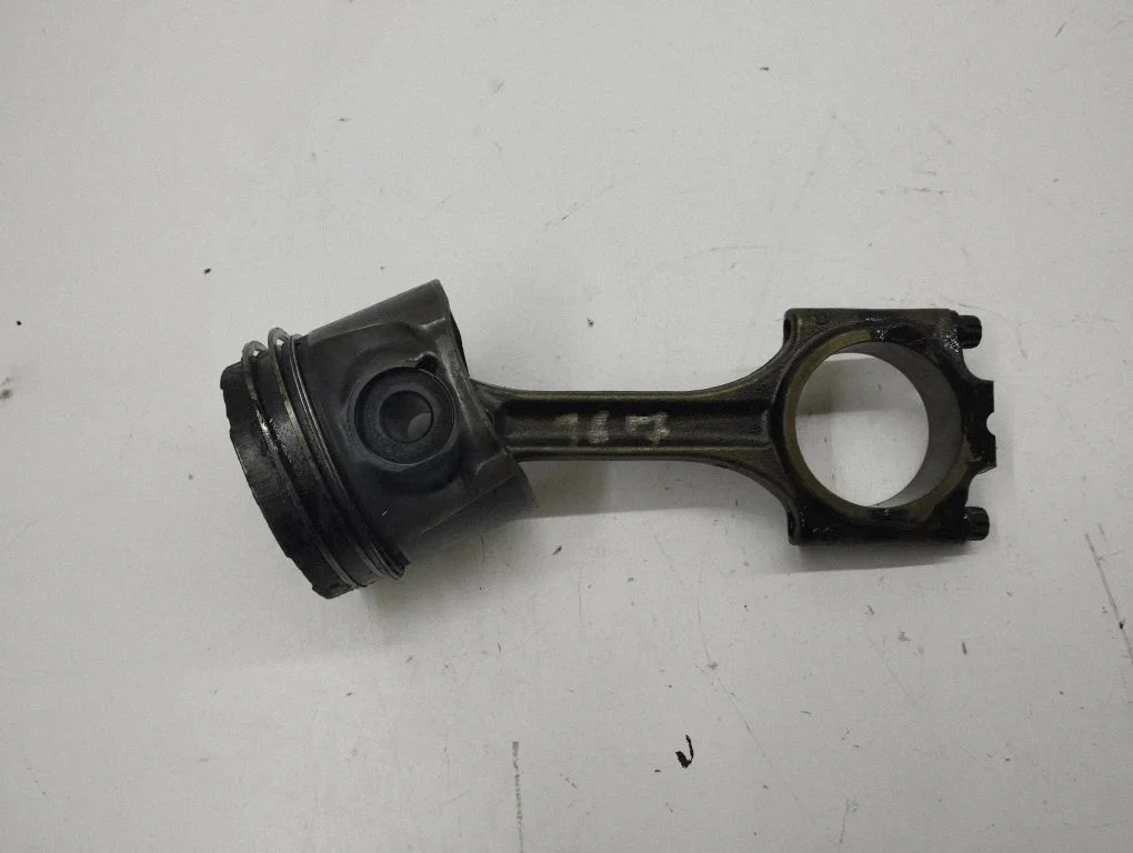 Piston with connecting rod