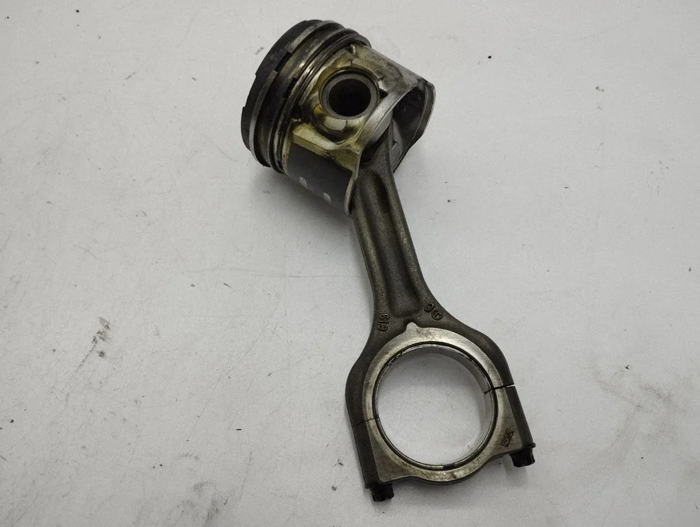 Piston with connecting rod