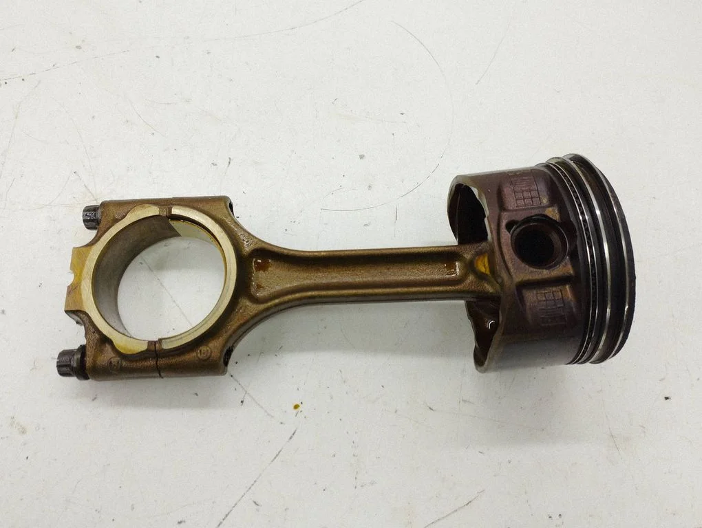 Piston with connecting rod