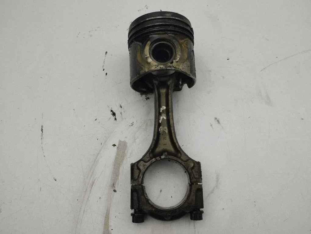 Piston with connecting rod