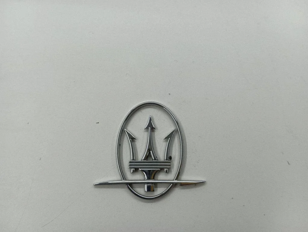 Manufacturers badge/model letters