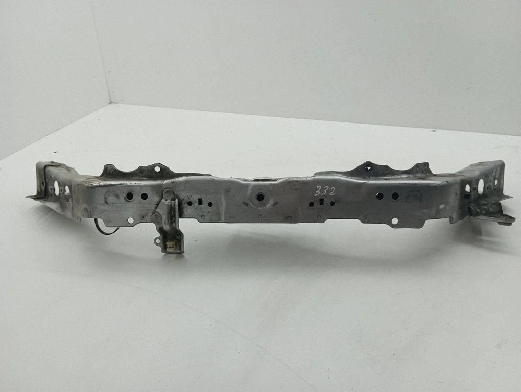 Top upper radiator support slam panel