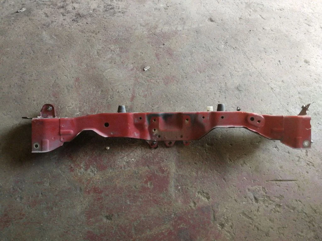 Top upper radiator support slam panel