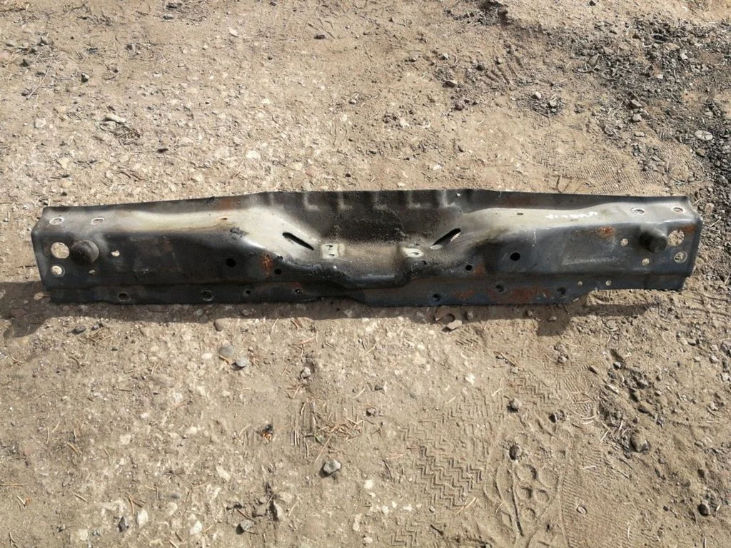Top upper radiator support slam panel