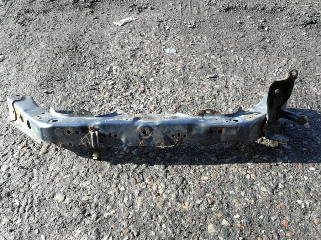 Top upper radiator support slam panel