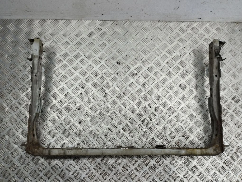 Bottom radiator support slam panel