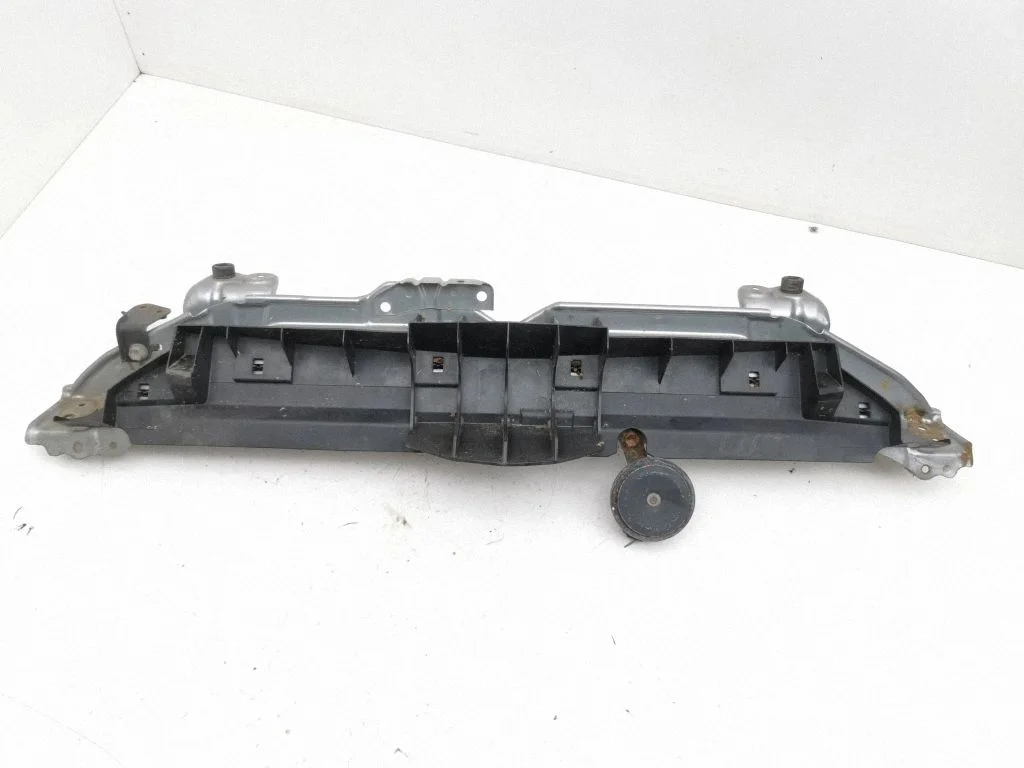 Bottom radiator support slam panel