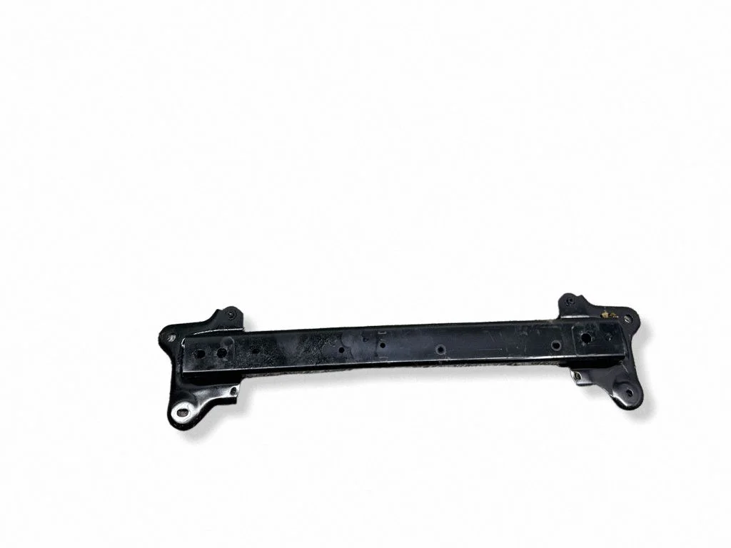 Bottom radiator support slam panel