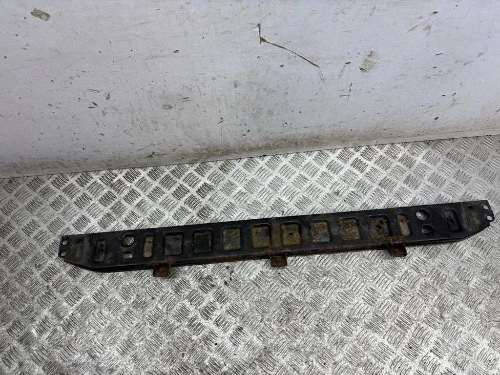 Bottom radiator support slam panel