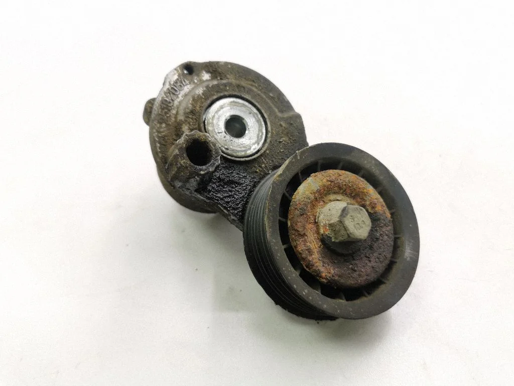 Alternator belt tensioner 25192084