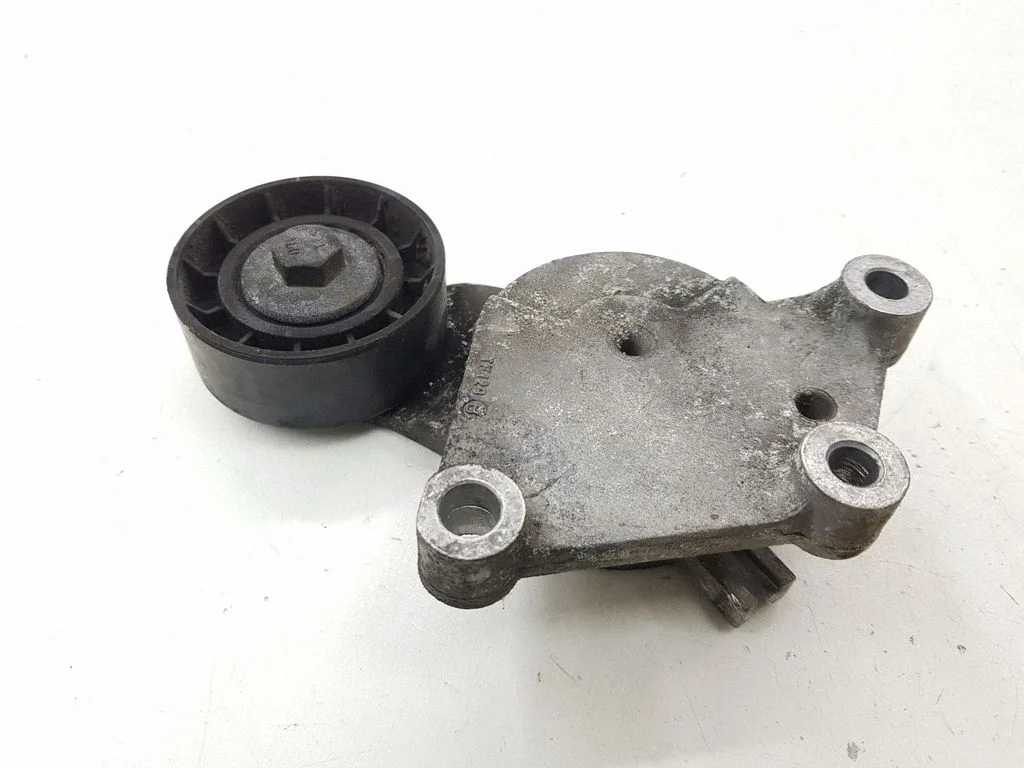 Alternator belt tensioner