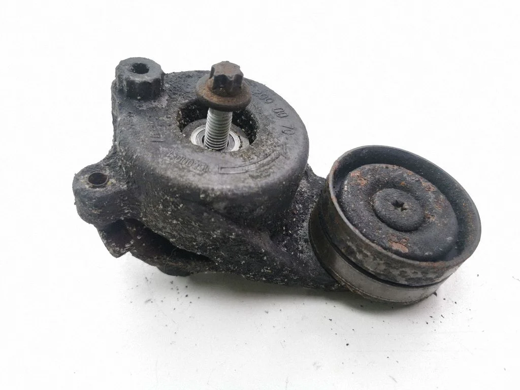 Alternator belt tensioner