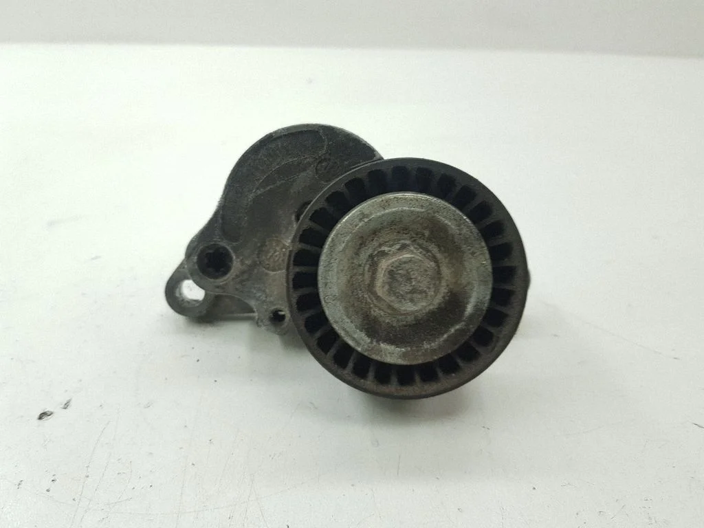 Alternator belt tensioner