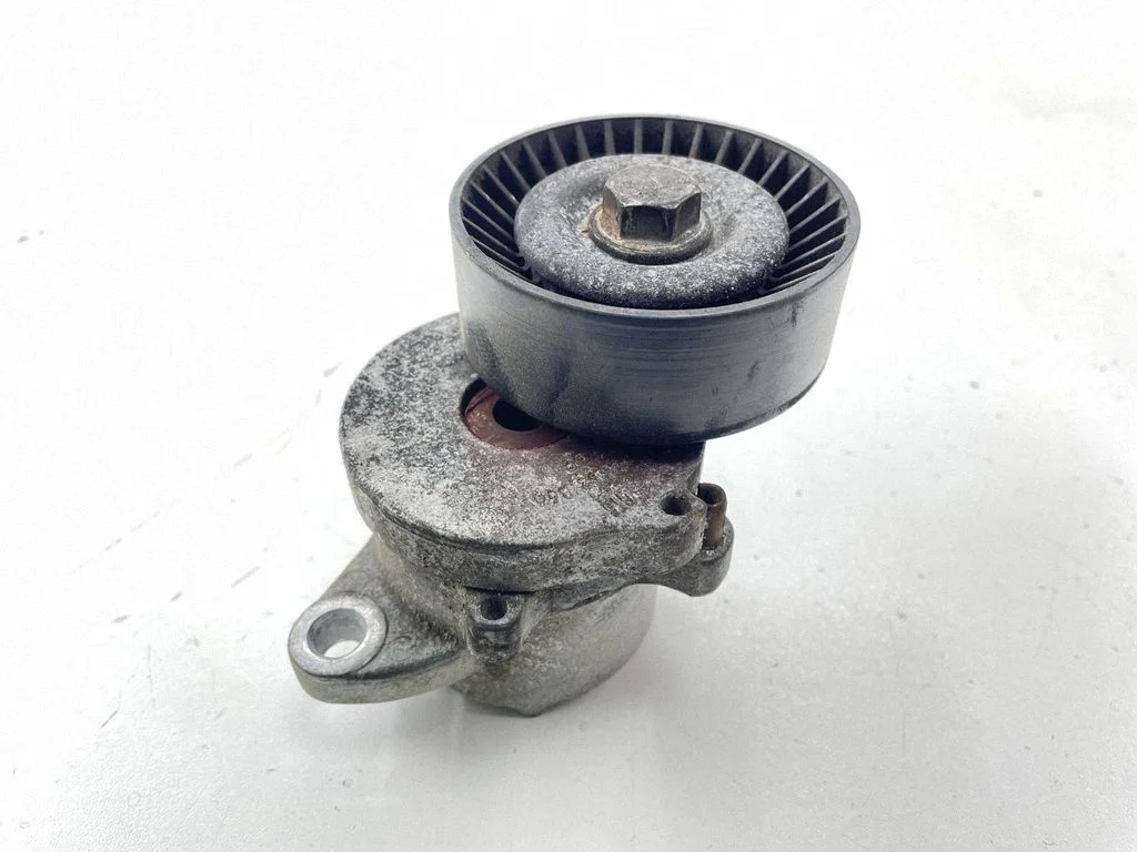 Alternator belt tensioner 55562864