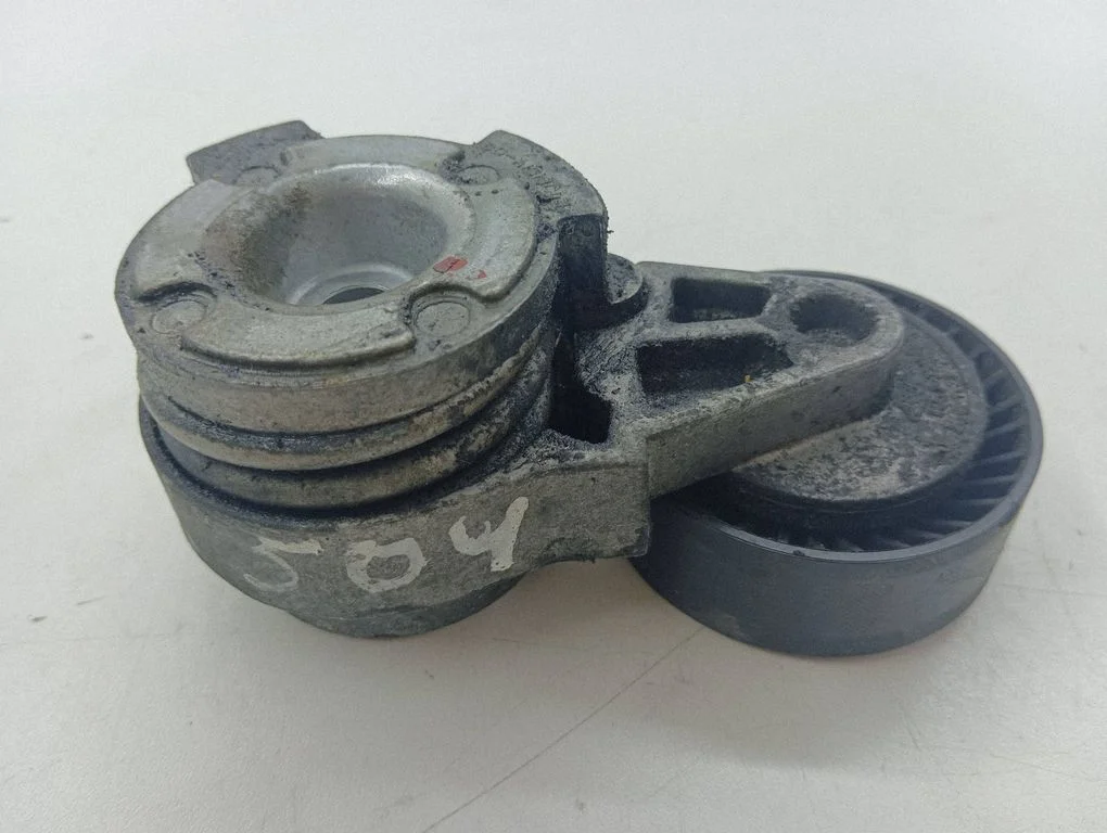 Alternator belt tensioner