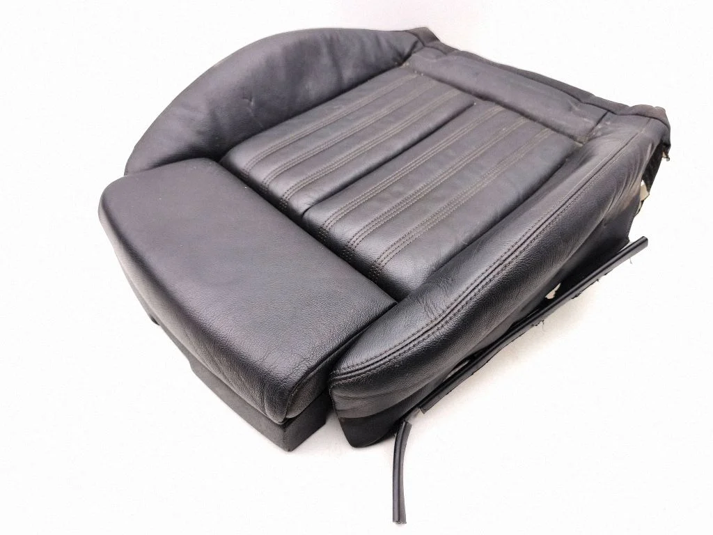 Front passenger seat console base – left