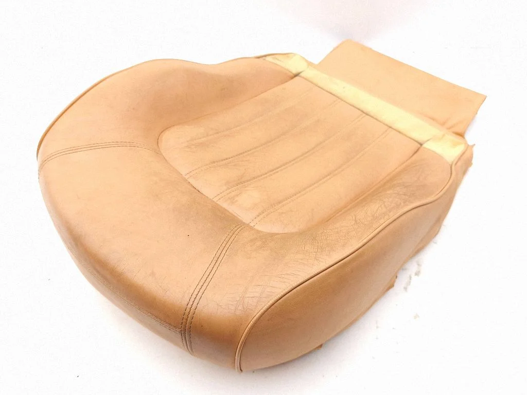 Front passenger seat console base – left
