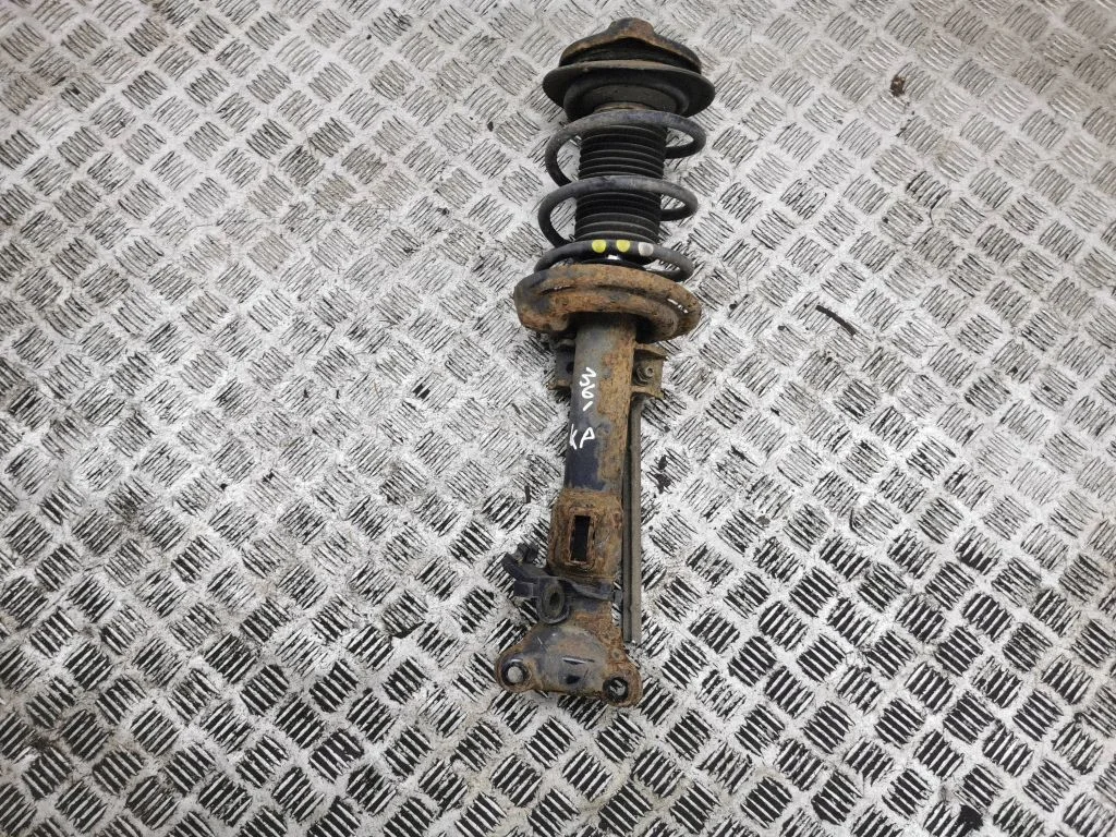 Front shock absorber with coil spring – left