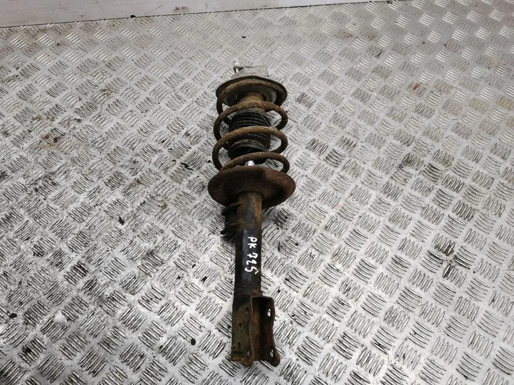 Front shock absorber with coil spring – left
