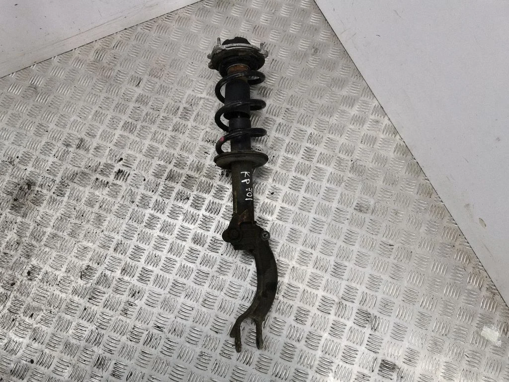 Front shock absorber with coil spring – left