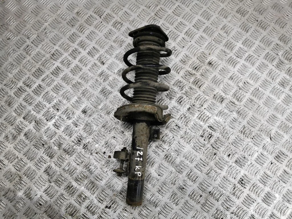 Front shock absorber with coil spring – left