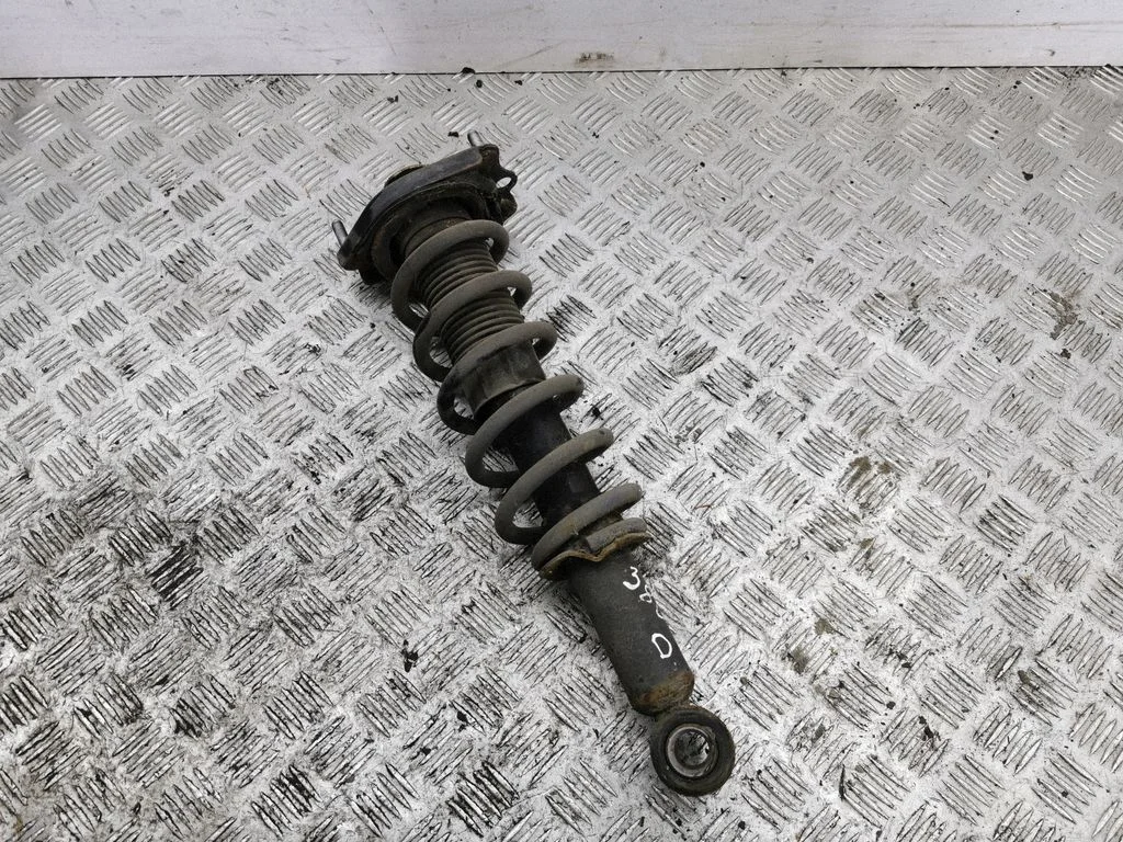 Rear shock absorber with coil spring – right